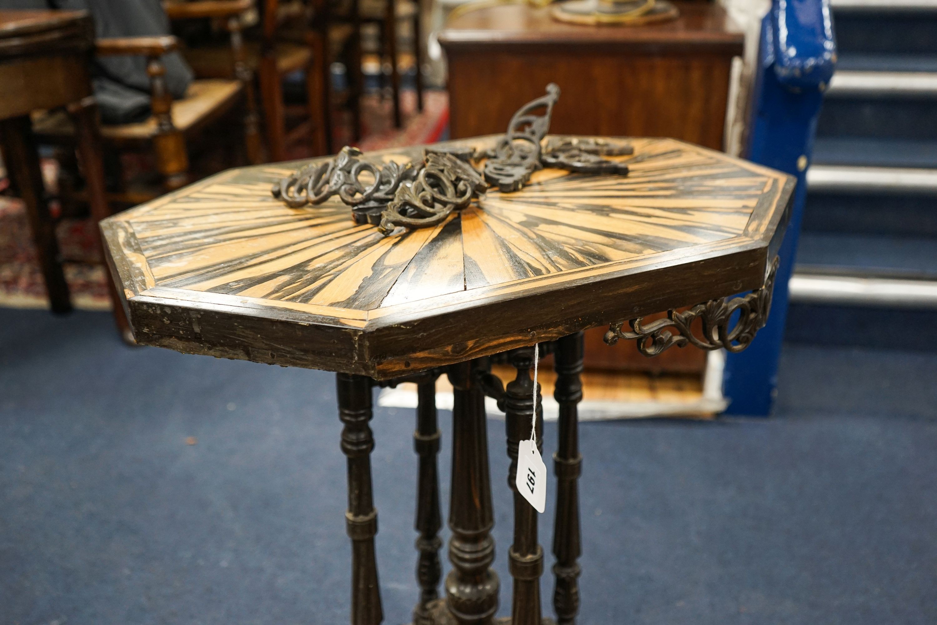 A 19th century Celanese carved ebony and coromandel veneered octagonal occasional table, width 57cm, depth 42cm, height 70cm
